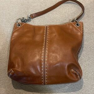Brown leather Michael Kohrs purse
